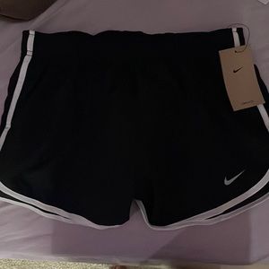 Tag still on Nike shorts